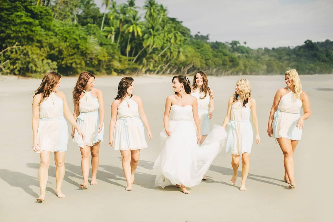 bride and bridesmaids on beach at villa punto de vista